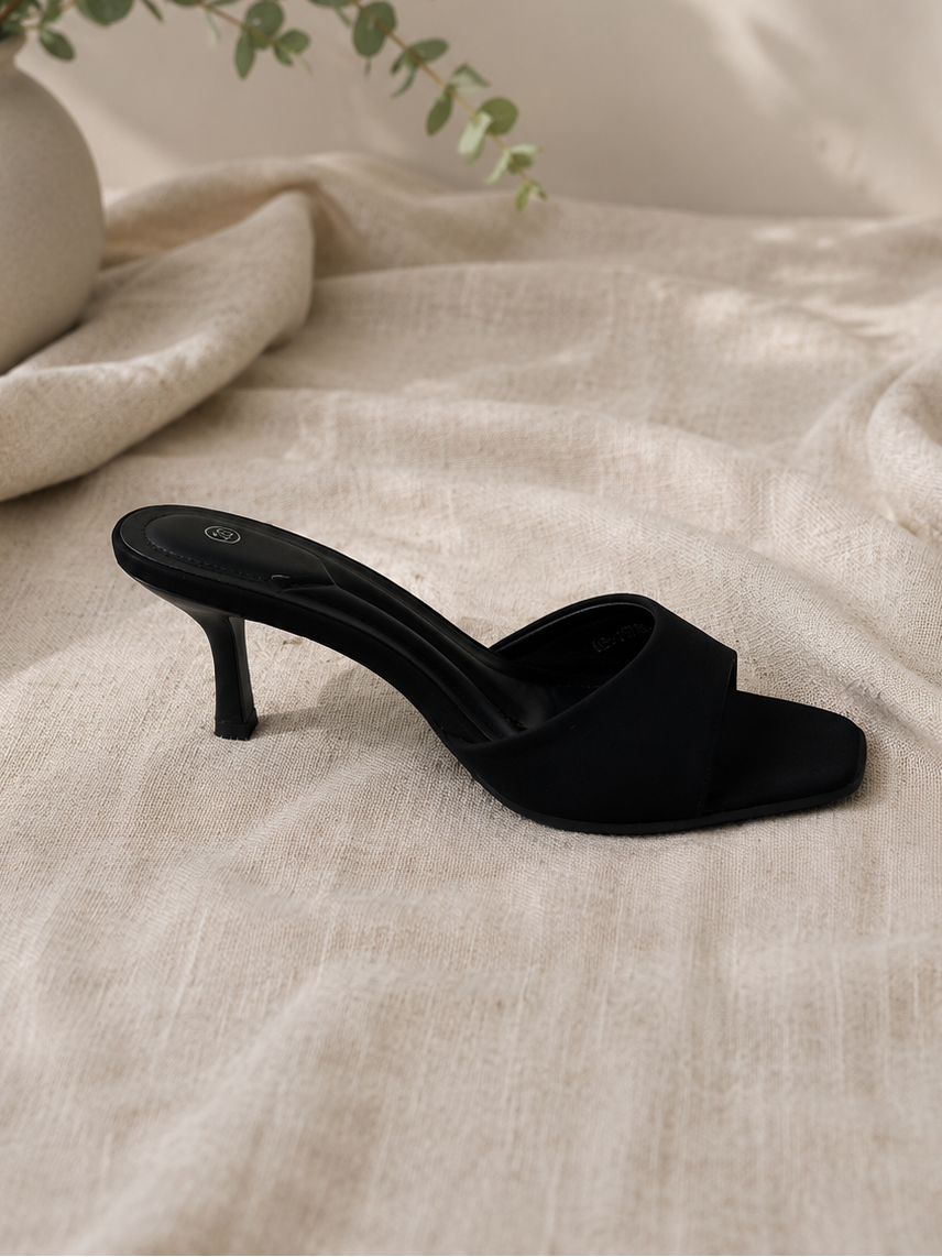 Mules à talon noir